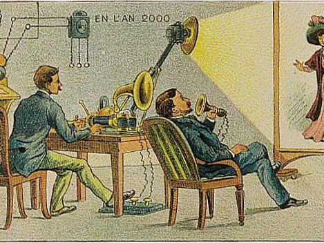 A 1910 French card showing a couple watching a distant person on a screen during a call